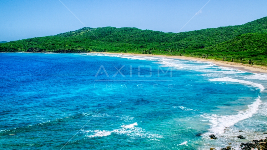 Sapphire blue waters and a deserted Caribbean beach in Culebra, Puerto Rico  Aerial Stock Photo AX102_120.0000121F | Axiom Images
