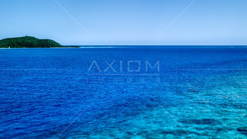 Turquoise ocean waters near a small island, Culebra, Puerto Rico Aerial Stock Photo AX102_132.0000290F | Axiom Images