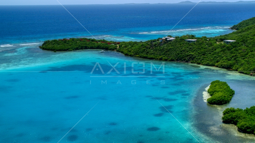 Oceanfront home on the Caribbean island coast of Culebra, Puerto Rico  Aerial Stock Photo AX102_136.0000337F | Axiom Images