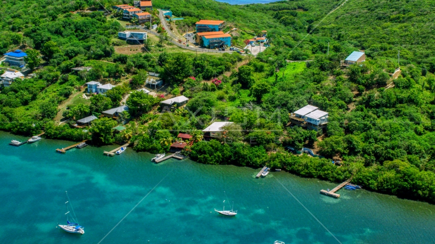 Caribbean homes with docks on the island of Culebra, Puerto Rico Aerial Stock Photo AX102_156.0000164F | Axiom Images