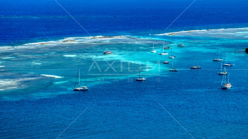 Sailboats anchored in the turquoise waters of the harbor, Culebra, Puerto Rico  Aerial Stock Photo AX102_169.0000000F | Axiom Images