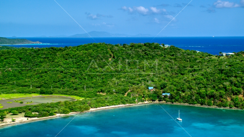 A view of hilltop and oceanfront homes in Culebra, Puerto Rico Aerial Stock Photo AX102_170.0000000F | Axiom Images
