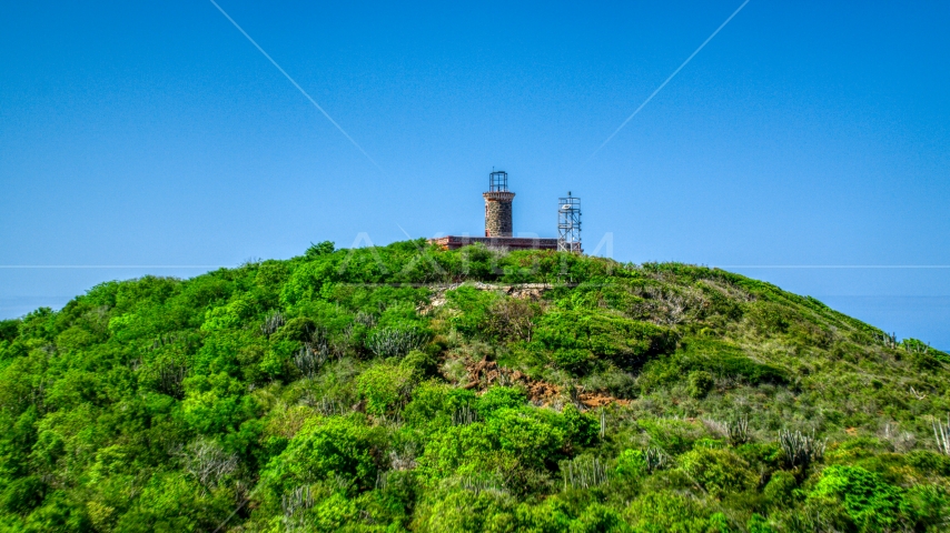 The hilltop Culebrita Lighthouse in Puerto Rico  Aerial Stock Photo AX102_177.0000274F | Axiom Images