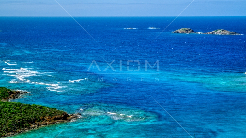 Tiny islands in sapphire blue ocean in the Caribbean, Culebrita, Puerto Rico  Aerial Stock Photo AX102_179.0000133F | Axiom Images