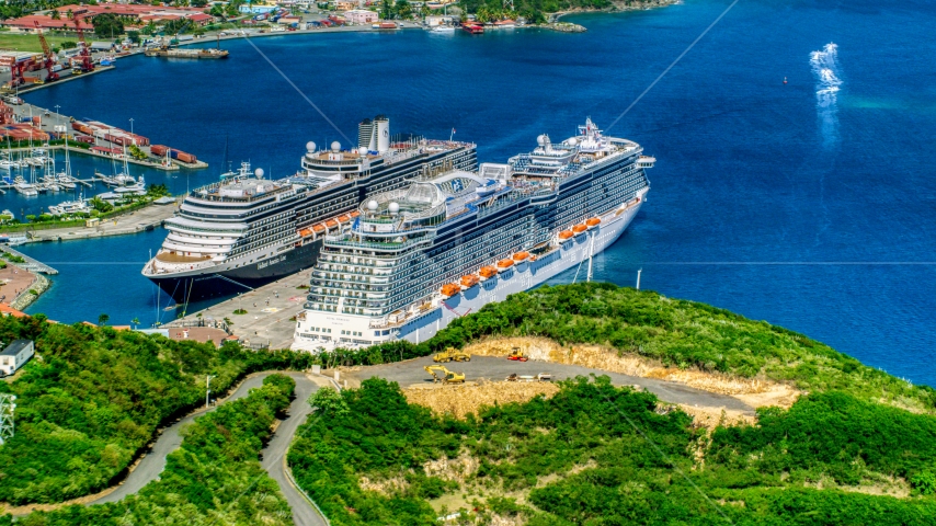 Docked cruise ships in the coastal town pf Charlotte Amalie, St. Thomas, US Virgin Islands Aerial Stock Photo AX102_199.0000000F | Axiom Images