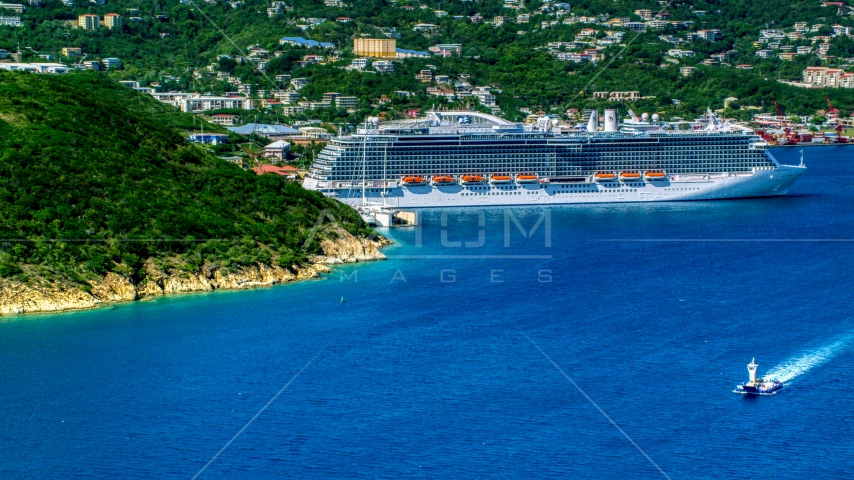 Cruise ship docked at the coastal island town of Charlotte Amalie, St. Thomas  Aerial Stock Photo AX102_200.0000000F | Axiom Images