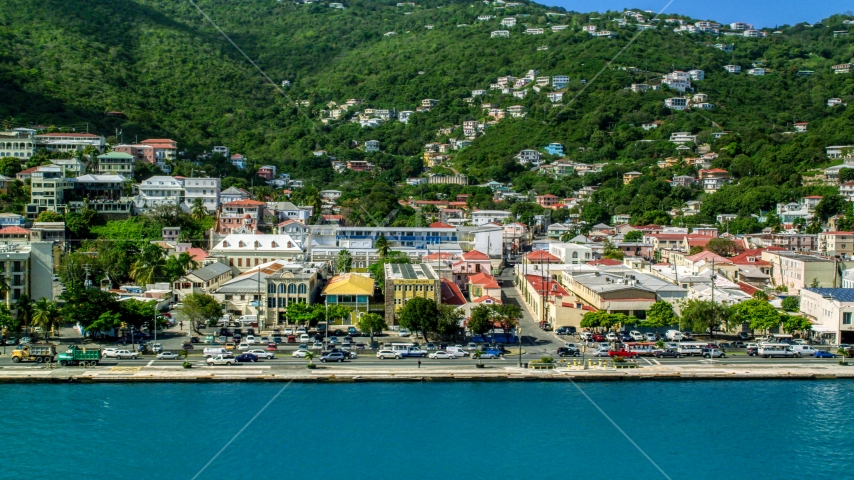 Island town buildings on the harbor shore in Charlotte Amalie, St Thomas  Aerial Stock Photo AX102_227.0000253F | Axiom Images