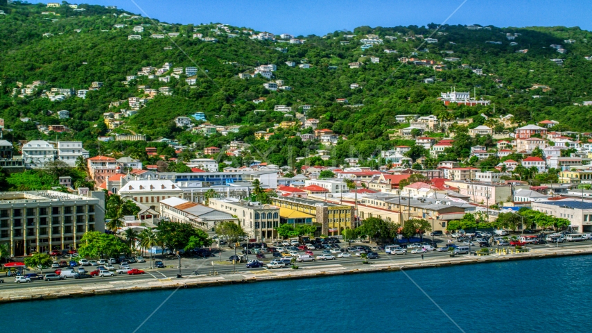 Buildings on the harbor shore in the Caribbean island to of Charlotte Amalie, St Thomas, US Virgin Islands  Aerial Stock Photo AX102_228.0000000F | Axiom Images