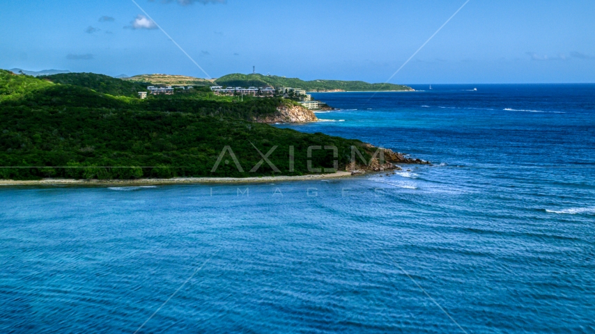 Oceanfront condominiums overlooking sapphire blue waters, Southside, St Thomas  Aerial Stock Photo AX102_235.0000000F | Axiom Images