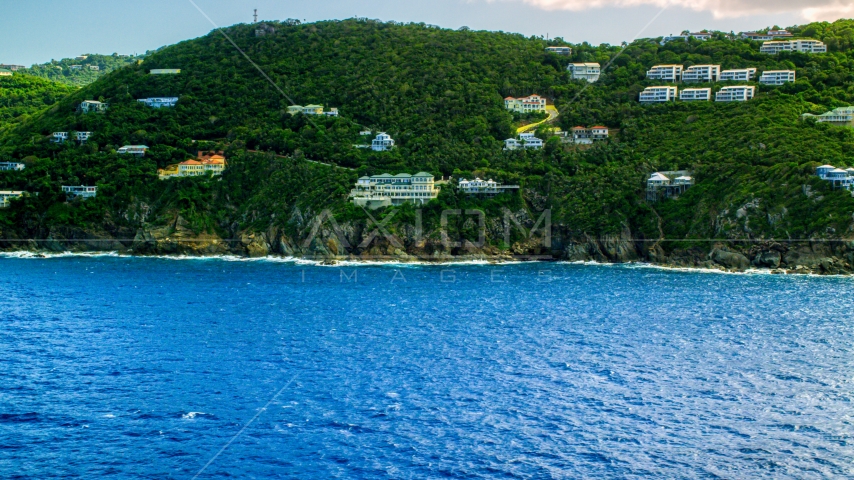 Hillside oceanfront island homes by sapphire waters, Northside, St Thomas Aerial Stock Photo AX102_262.0000000F | Axiom Images