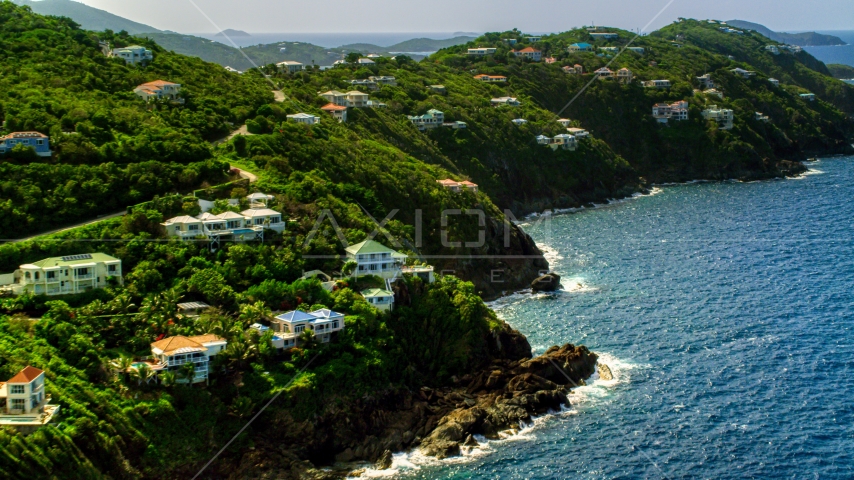 Hillside mansions on a Caribbean island coast in Northside, St Thomas, the US Virgin Islands   Aerial Stock Photo AX102_267.0000266F | Axiom Images