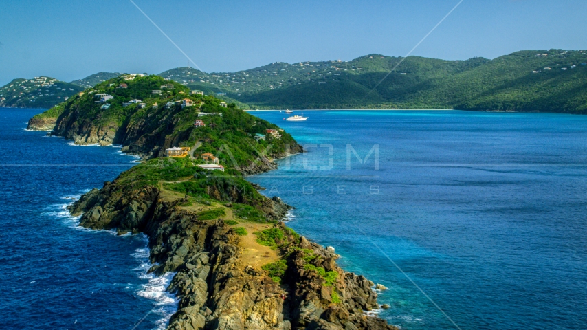 Hillside oceanfront homes by sapphire blue Caribbean waters, Magens Bay, St Thomas  Aerial Stock Photo AX102_280.0000000F | Axiom Images