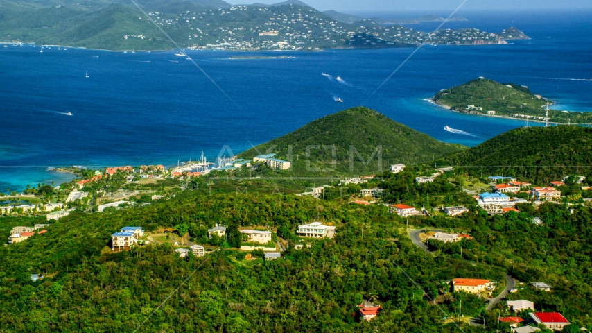 Caribbean resorts beside sapphire blue waters, East End, St Thomas Aerial Stock Photo AX103_013.0000034F | Axiom Images
