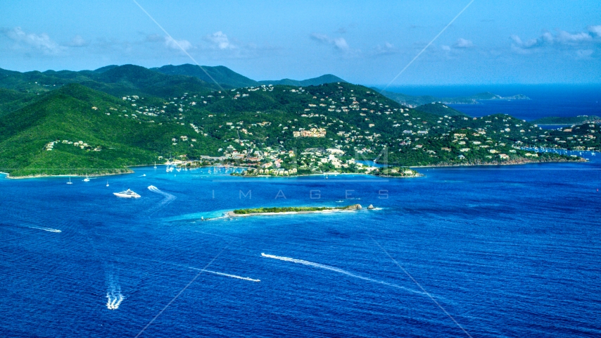Coastal town on a hillside and blue Caribbean waters, Cruz Bay, St John Aerial Stock Photo AX103_016.0000000F | Axiom Images
