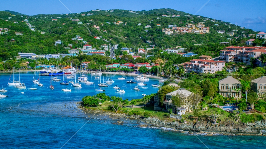 Turquoise blue Caribbean waters in the harbor with boats, Cruz Bay, St John Aerial Stock Photo AX103_030.0000000F | Axiom Images
