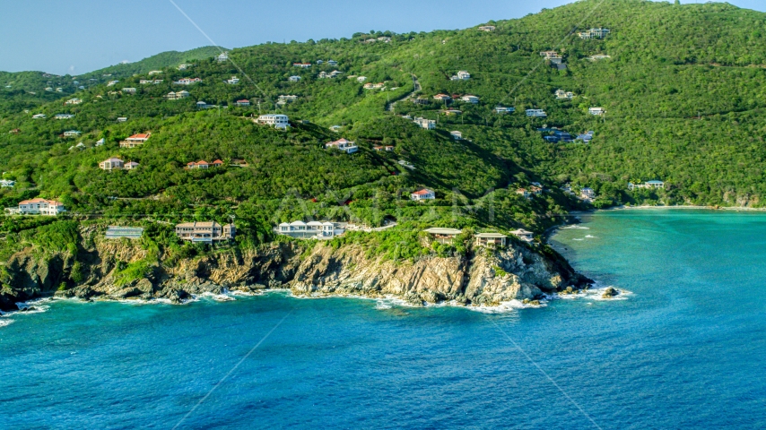 Hillside mansions overlooking Caribbean blue waters, Cruz Bay, St John Aerial Stock Photo AX103_037.0000000F | Axiom Images
