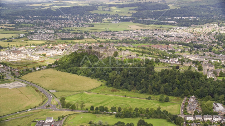 Stirling Castle and residential area in Stirling, Scotland Aerial Stock Photo AX109_015.0000000F | Axiom Images