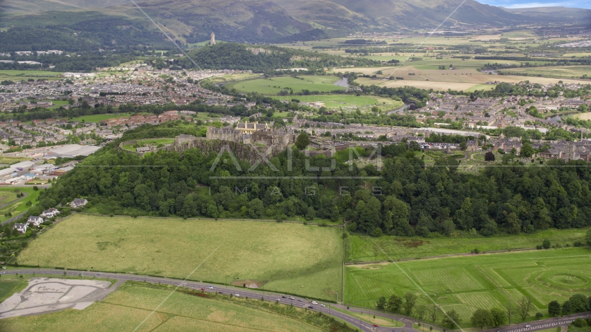 Stirling Castle and residential area in Scotland Aerial Stock Photo AX109_017.0000000F | Axiom Images