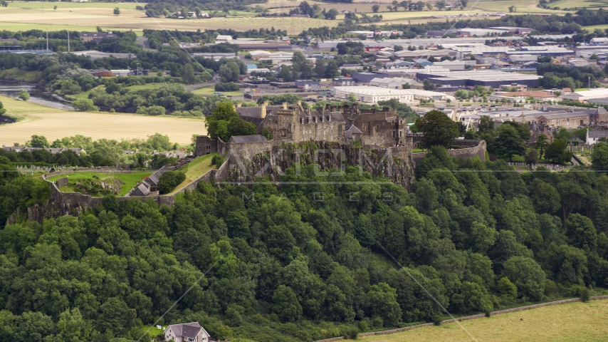 Iconic Stirling Castle on a hill in Scotland Aerial Stock Photo AX109_021.0000000F | Axiom Images