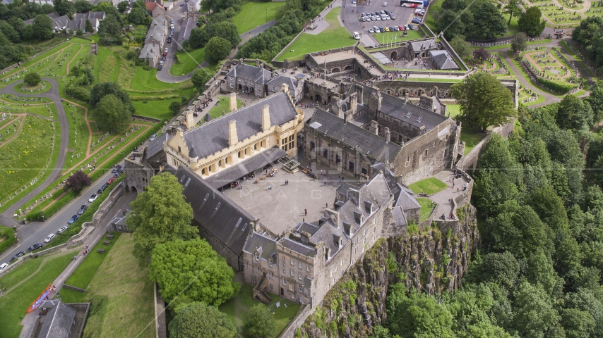A view of the grounds of iconic Stirling Castle, Scotland Aerial Stock Photo AX109_025.0000198F | Axiom Images