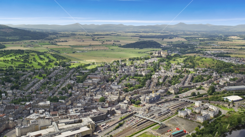 A view of historic Stirling Castle and residential area, Scotland Aerial Stock Photo AX109_029.0000000F | Axiom Images