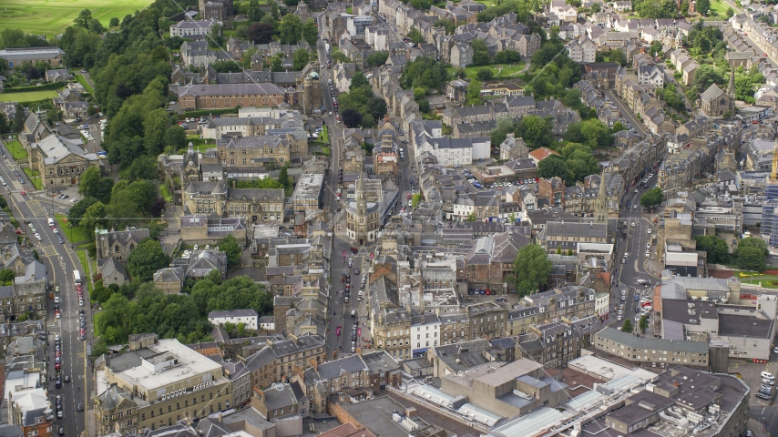 A view of city streets and apartment buildings in Stirling, Scotland Aerial Stock Photo AX109_031.0000000F | Axiom Images