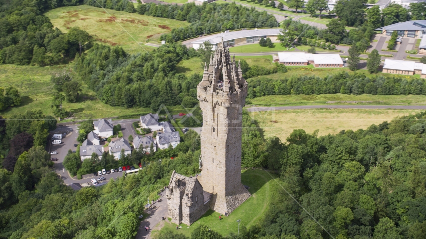 The iconic Wallace Monument in Stirling, Scotland Aerial Stock Photo AX109_050.0000000F | Axiom Images
