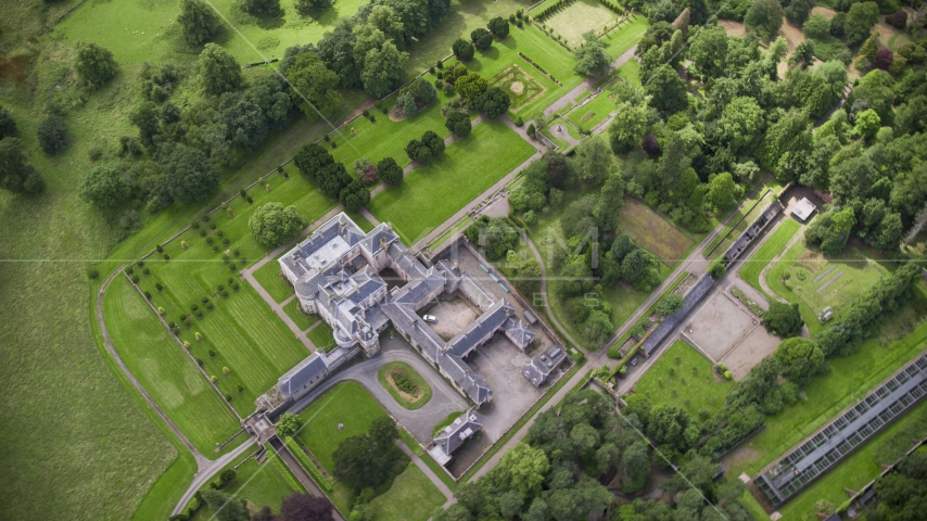 A bird's eye view of Keir House and estate grounds in Stirling, Scotland Aerial Stock Photo AX109_060.0000221F | Axiom Images