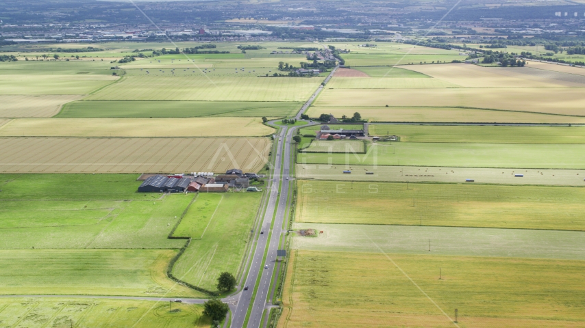 A roundabout on the A905 highway through farmland, Falkirk, Scotland Aerial Stock Photo AX109_114.0000000F | Axiom Images