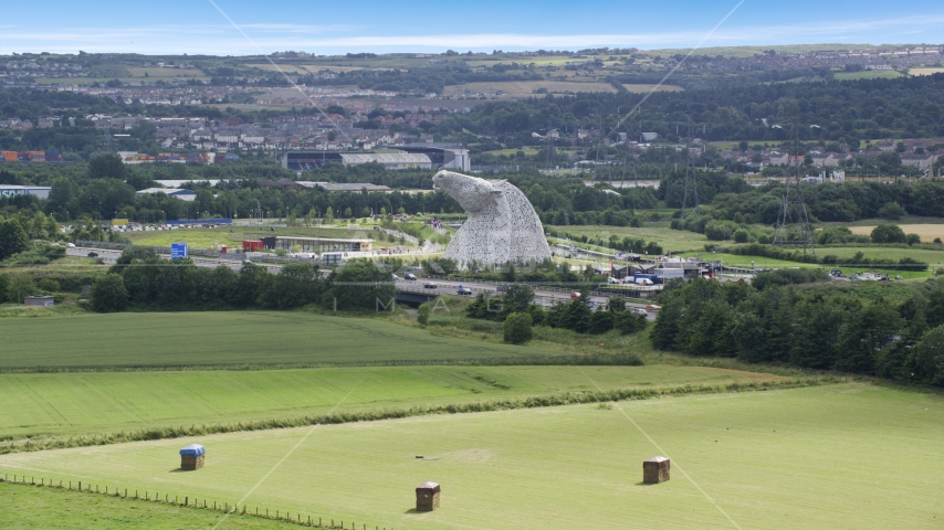 The Kelpies sculptures in Falkirk, Scotland Aerial Stock Photo AX109_121.0000000F | Axiom Images