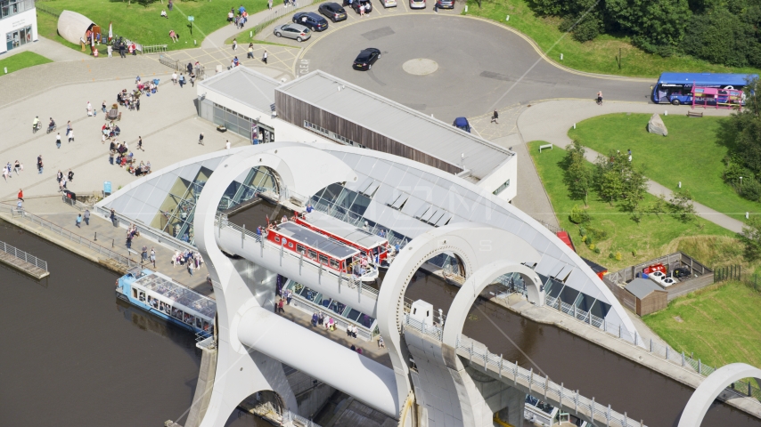 Two ferries on the Falkirk Wheel boat lift in Scotland Aerial Stock Photo AX109_145.0000096F | Axiom Images