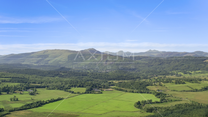 Scottish forest, farmland and mountains, Aberfoyle, Scotland Aerial Stock Photo AX110_040.0000000F | Axiom Images