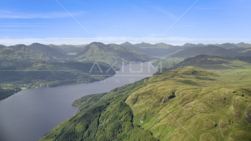 Loch Lomond and green mountains in the Scottish Highlands, Scotland Aerial Stock Photo AX110_058.0000000F | Axiom Images