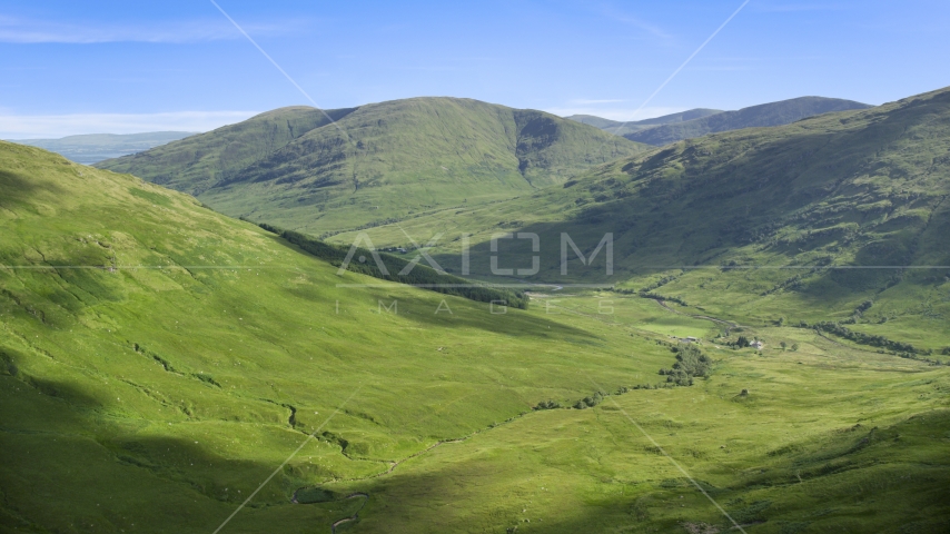 Beinn Dubh, a lush green mountain, Scottish Highlands, Scotland Aerial Stock Photo AX110_096.0000000F | Axiom Images