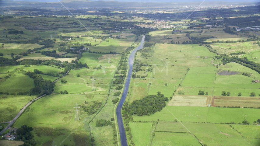 A river through farm fields in Cumbernauld, Scotland Aerial Stock Photo AX110_231.0000000F | Axiom Images