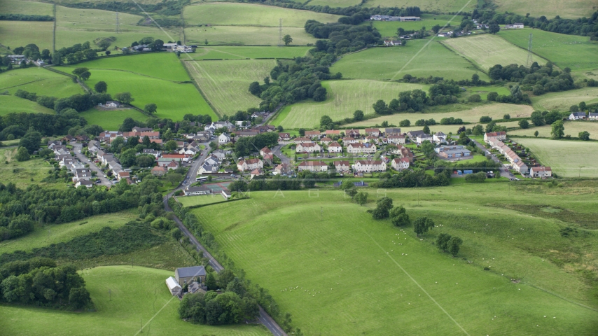 Rural homes surrounded by farmland in Cumbernauld, Scotland Aerial Stock Photo AX110_233.0000280F | Axiom Images