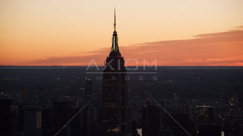 Sunrise at the Empire State Building in Midtown Manhattan, New York City Aerial Stock Photo AX118_010.0000332F | Axiom Images