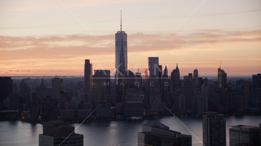 World Trade Center skyline across Hudson River at sunrise in Lower Manhattan, New York City Aerial Stock Photo AX118_030.0000060F | Axiom Images
