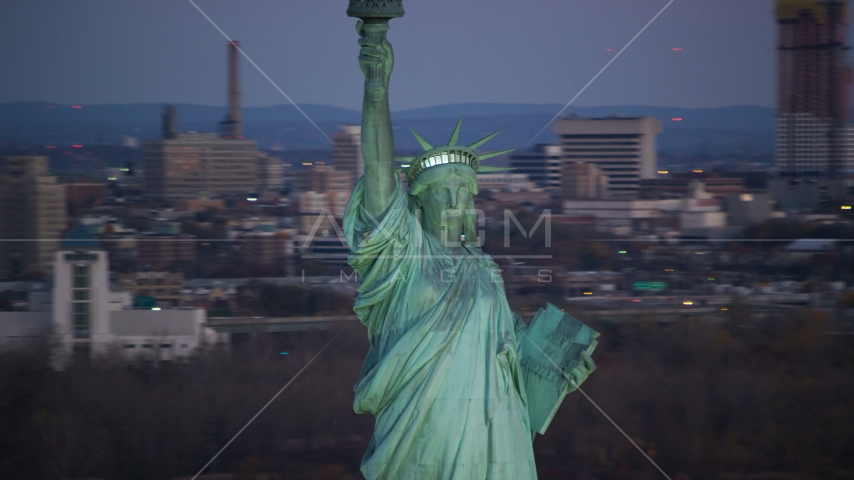 Front of the Statue of Liberty at sunrise, New York Aerial Stock Photo AX118_048.0000078F | Axiom Images
