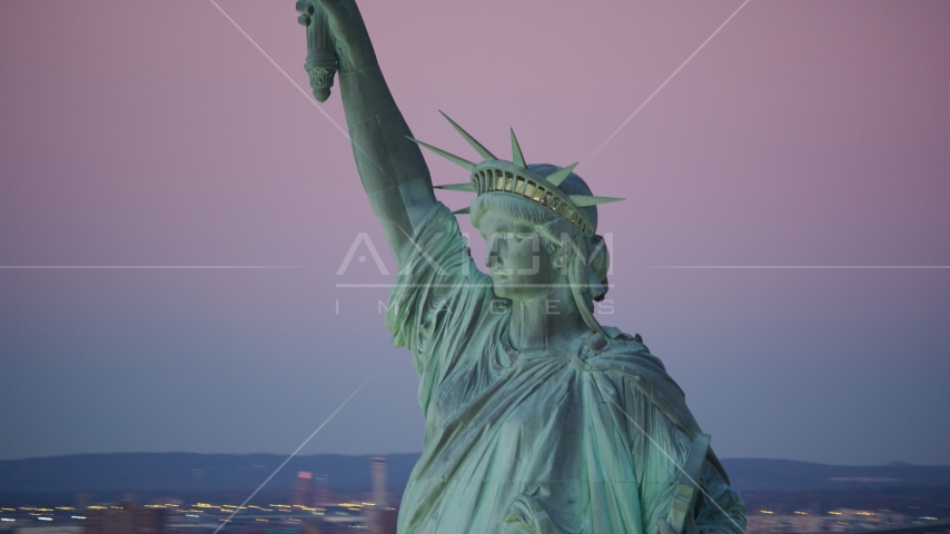 Profile of the Statue of Liberty at sunrise, New York Aerial Stock Photo AX118_060.0000000F | Axiom Images