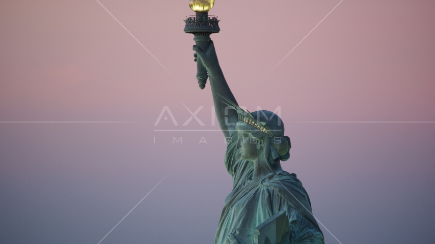 The Statue of Liberty's profile at sunrise, New York Aerial Stock Photo AX118_060.0000227F | Axiom Images