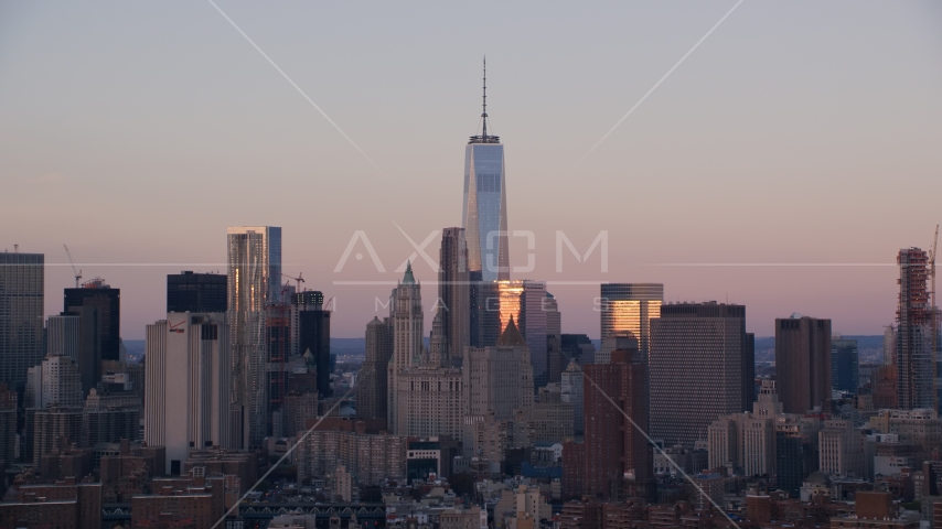Freedom Tower and skyscrapers at sunrise in Lower Manhattan, New York City Aerial Stock Photo AX118_070.0000078F | Axiom Images