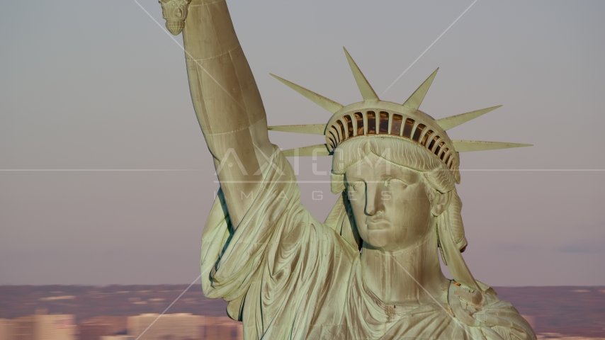 Close-up of the Statue of Liberty at sunrise in New York Aerial Stock Photo AX118_116.0000128F | Axiom Images