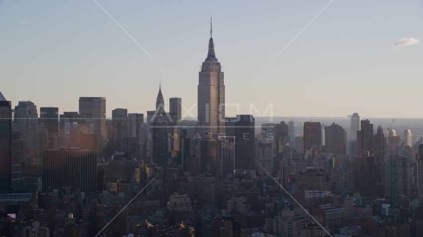 Empire State Building at sunrise in New York City Aerial Stock Photo AX118_162.0000089F | Axiom Images