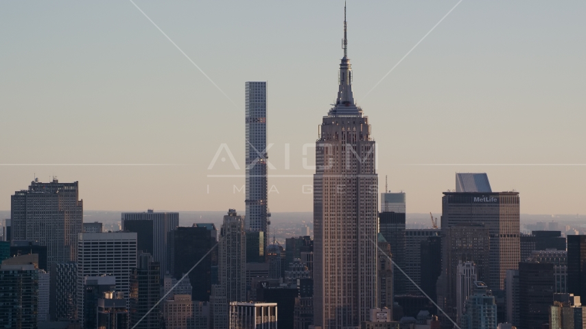 Empire State Building and 432 Park Avenue at sunrise in Midtown Manhattan, New York City Aerial Stock Photo AX118_166.0000205F | Axiom Images
