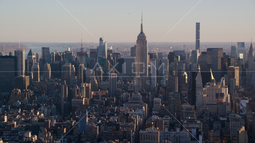 Empire State Building and Midtown skyscrapers at sunrise in New York City Aerial Stock Photo AX118_168.0000173F | Axiom Images