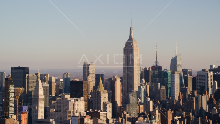 Empire State Building and Midtown high-rises at sunrise in New York City Aerial Stock Photo AX118_176.0000000F | Axiom Images