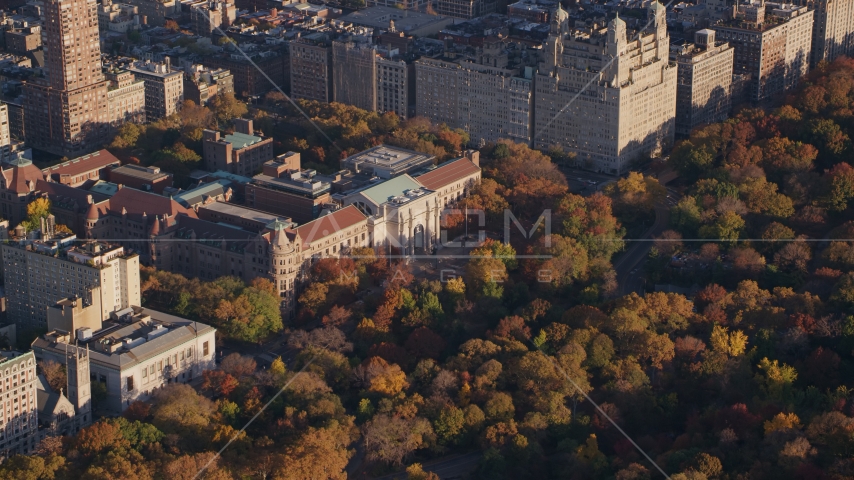 Museum of Natural History and autumn leaves at sunrise in Upper West Side, New York City Aerial Stock Photo AX118_191.0000274F | Axiom Images