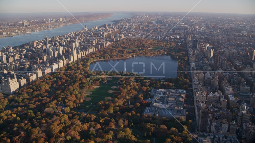 Central Park with autumn leaves and The Met at sunrise in New York City Aerial Stock Photo AX118_192.0000000F | Axiom Images
