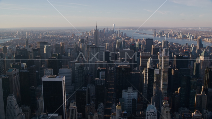 Midtown Manhattan skyscrapers at sunrise in New York City Aerial Stock Photo AX118_197.0000231F | Axiom Images